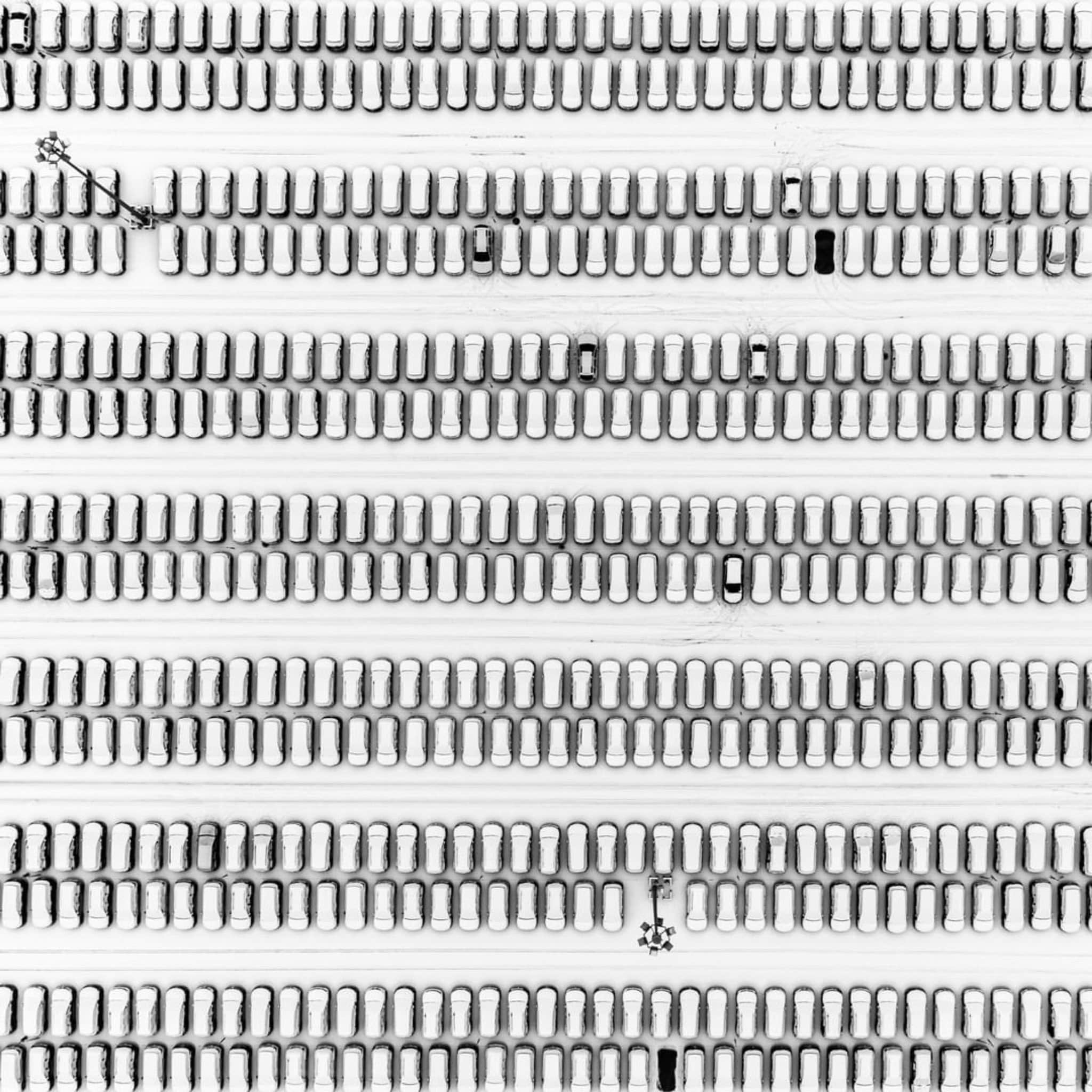 Parked cars covered by the season’s first snowfall in Moscow